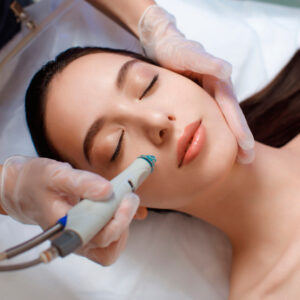 professional-female-cosmetologist-doing-hydrafacial-procedure